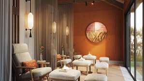 A modern interior with a large window, wooden furniture, and a decorative wall piece. - NHAAN Resort & Spa Hoi An, Tapestry Collection by Hilton (Hoi An)