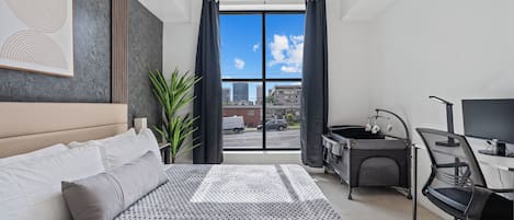 Apartment, 2 Bedrooms, Non Smoking, Kitchen | Desk, laptop workspace, blackout drapes, iron/ironing board