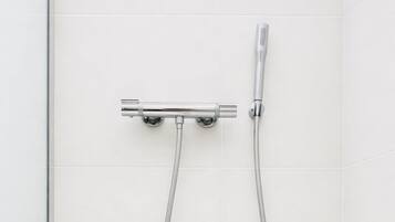 Shower, eco-friendly toiletries, hair dryer, towels