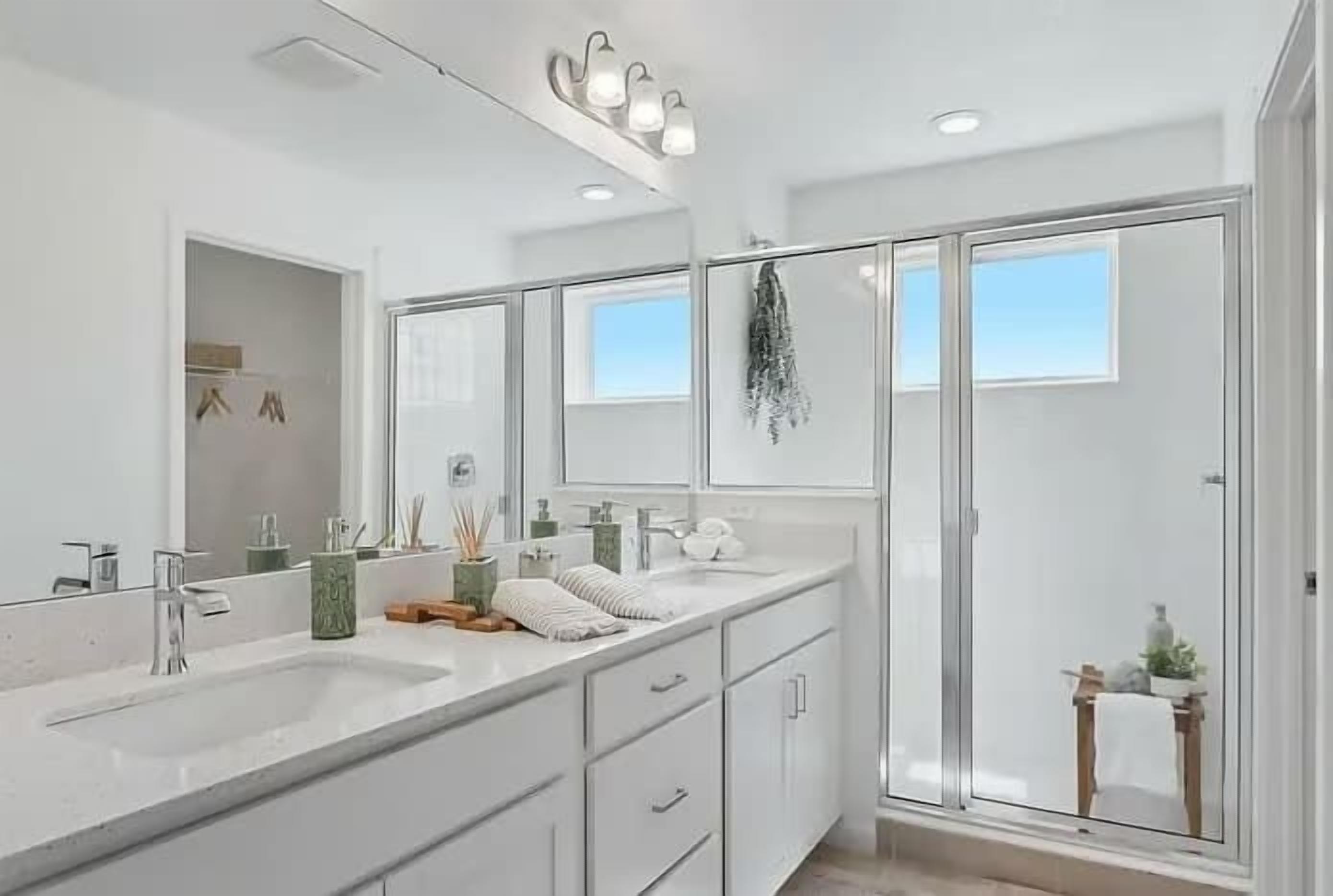 Shower, hair dryer, towels, shampoo