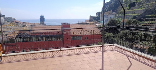 Penthouse in the historical center with sea view 5 minutes away from main square