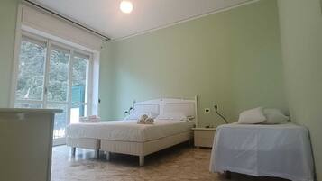 Family Penthouse, 1 Bedroom, Terrace, Sea View | Down duvets, in-room safe, blackout curtains, iron/ironing board