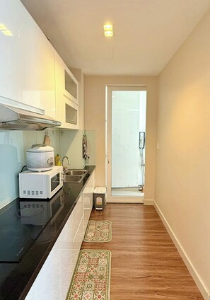 Standard Apartment, Balcony, Pool View | Private kitchen - HOMESTAY SKYCENTER 2 PHONG NGU (ho Chi Minh)