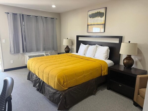 Habitación individual Deluxe | Cortinas blackout, wifi gratis y ropa de cama 
