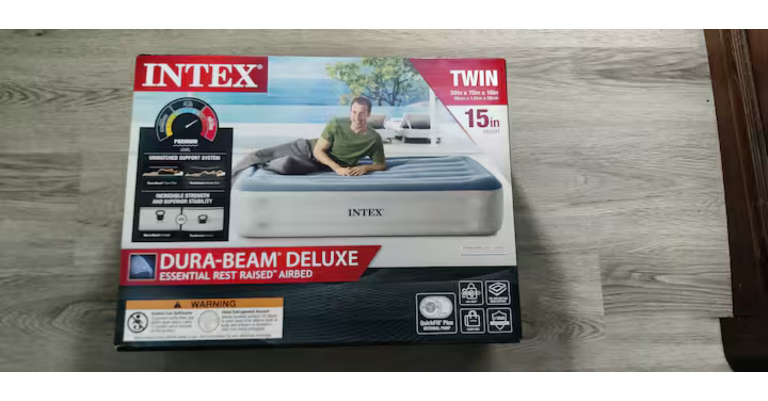 A box of Intex Twin 15-inch Dura-Beam Deluxe mattresses.