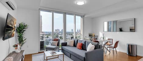 Appartement, 1 grand lit et 1 canapé-lit, non-fumeurs, coin cuisine | Coin séjour