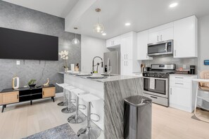 Apartment, 2 Bedrooms, Non Smoking, Kitchen | Private kitchen | Fridge, microwave, oven, stovetop - Reunion by Stylish Stays (Tulsa)
