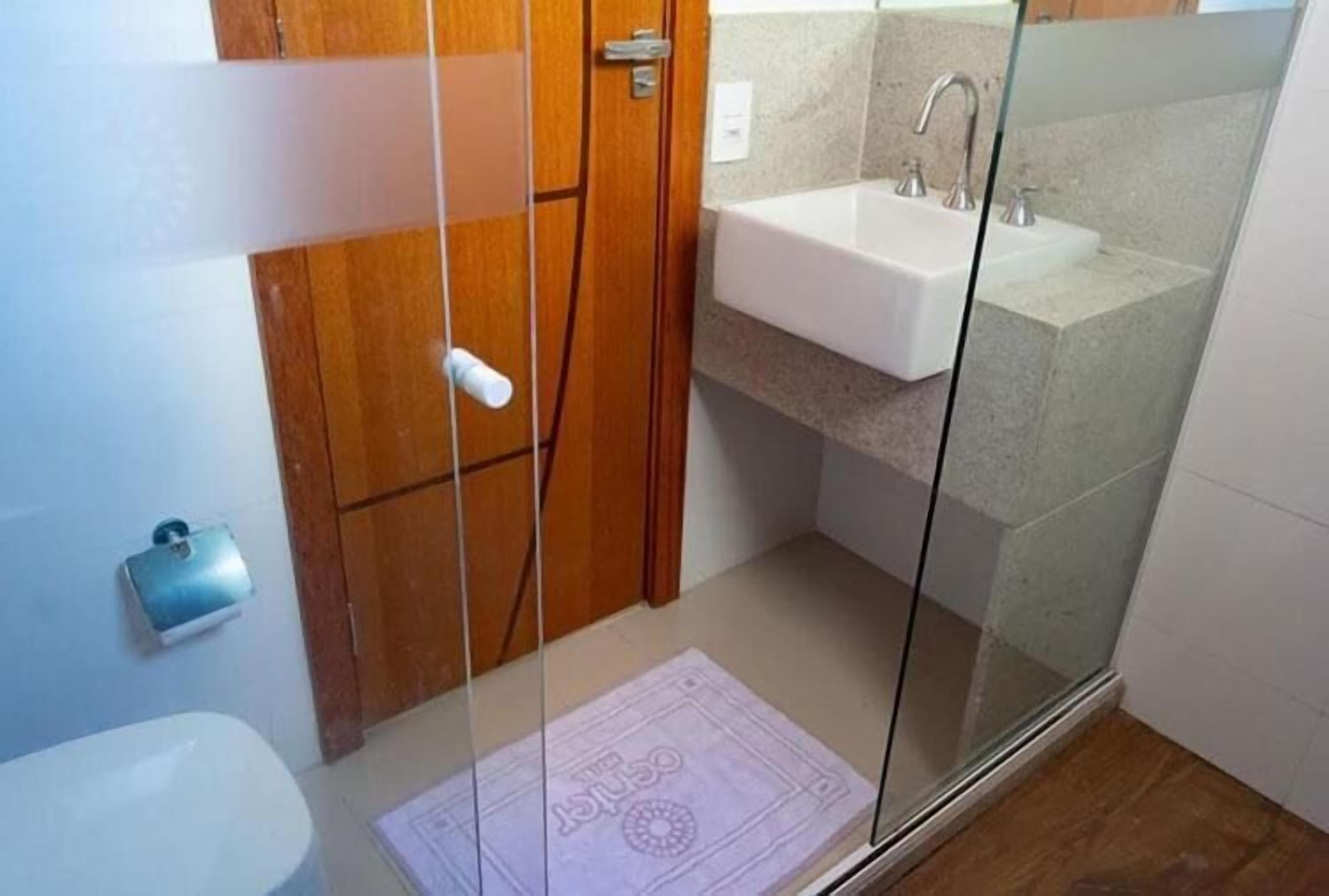 Double Room | Bathroom | Shower, hair dryer, towels, toilet paper