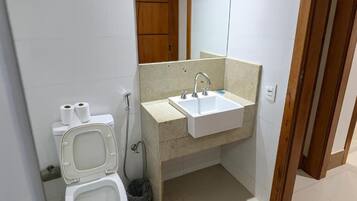 Double Room | Bathroom | Shower, hair dryer, towels, toilet paper