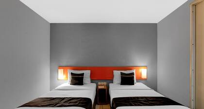 Stilvolles Deluxe-Zweibettzimmer mit kostenlosem