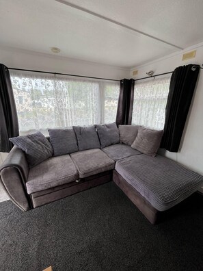 Living area - Cosy 8 berth caravan with side decking at Southview, near Skegness ref 33009ML (Skegness)