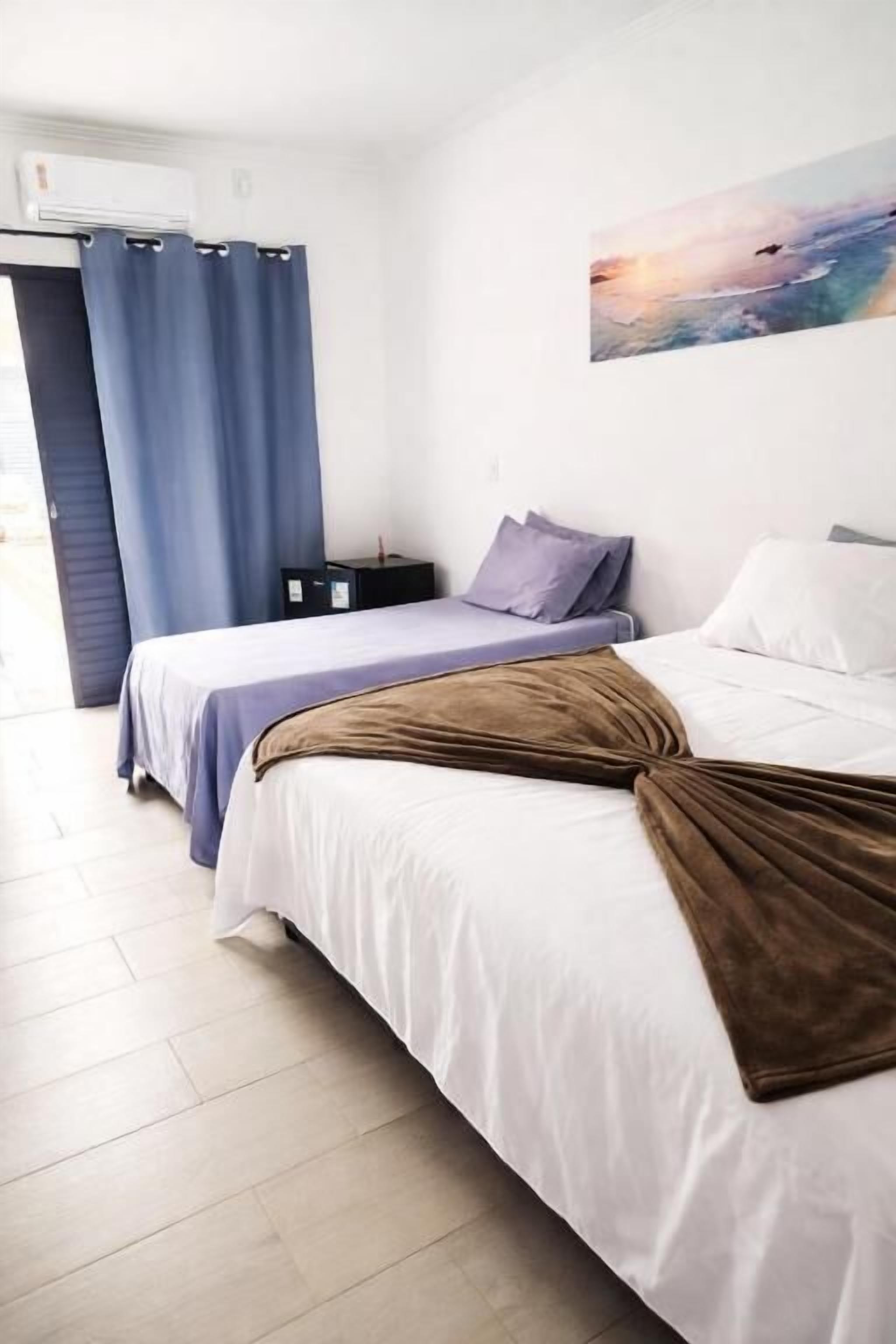 Deluxe-værelse til 4 personer - udsigt til pool