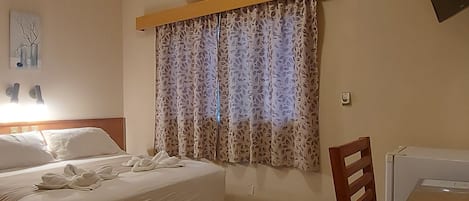 Suite estándar, vista a la ciudad | Escritorio y wifi gratis