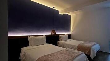 Family Room, Balcony, City View | Spa