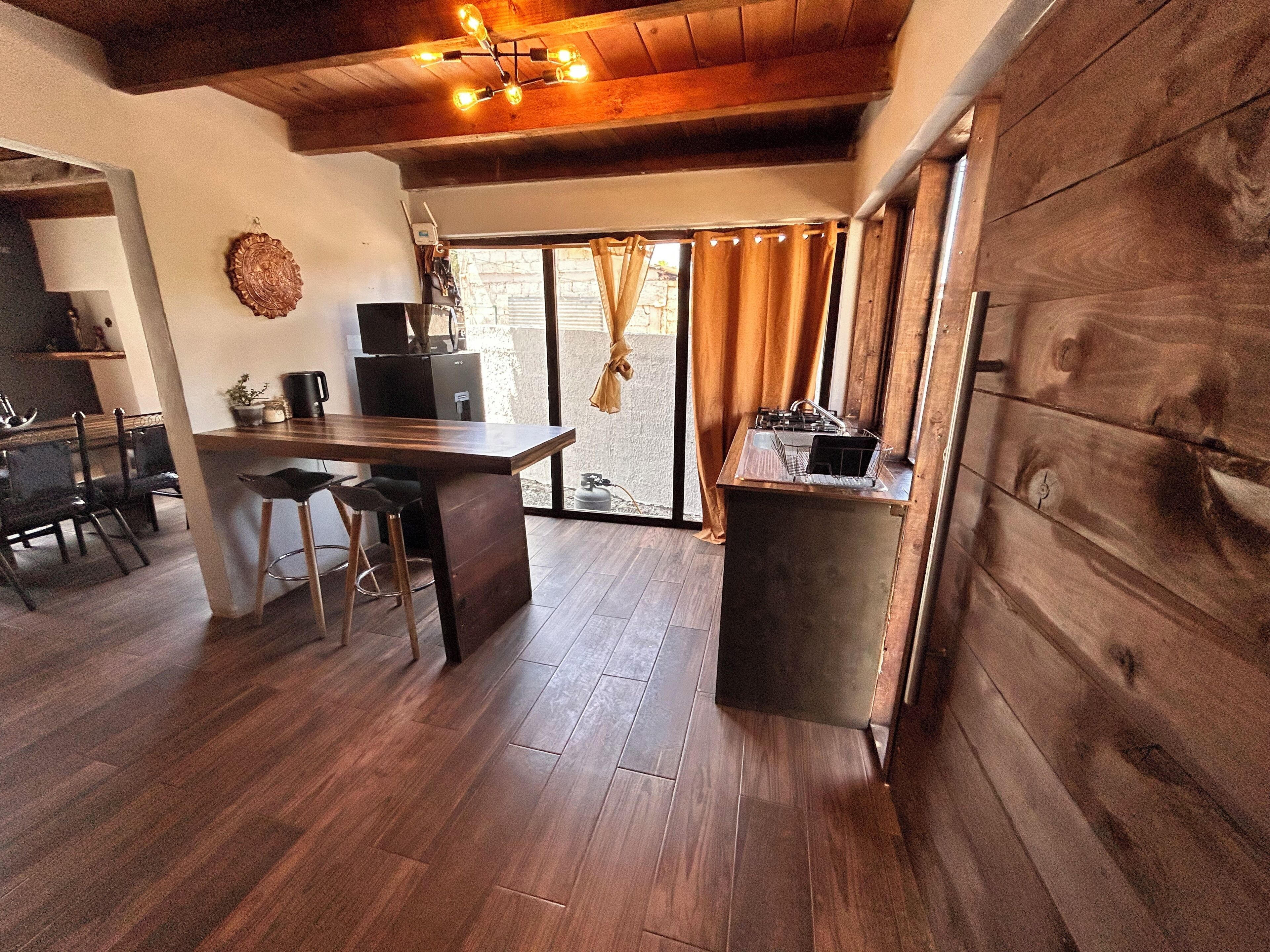 Family Cabin, Patio, Garden View | Private kitchen | Fridge, coffee/tea maker, cookware/dishes/utensils