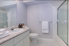 Hair dryer, towels, soap, toilet paper