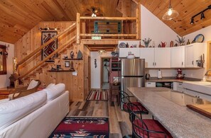 Interior - Cozy 3-bedroom log cabin nestled in the peaceful woods of central Maine (New Portland)