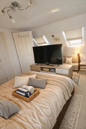 4 dormitorios, tabla de planchar con plancha, wifi y ropa de cama