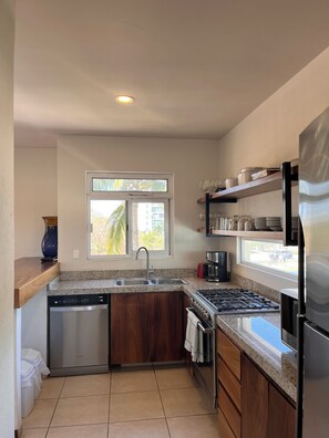 Private kitchen - Bright and airy 2BR/2BA Nueva Vallarta condo with beach access (Nayarit)