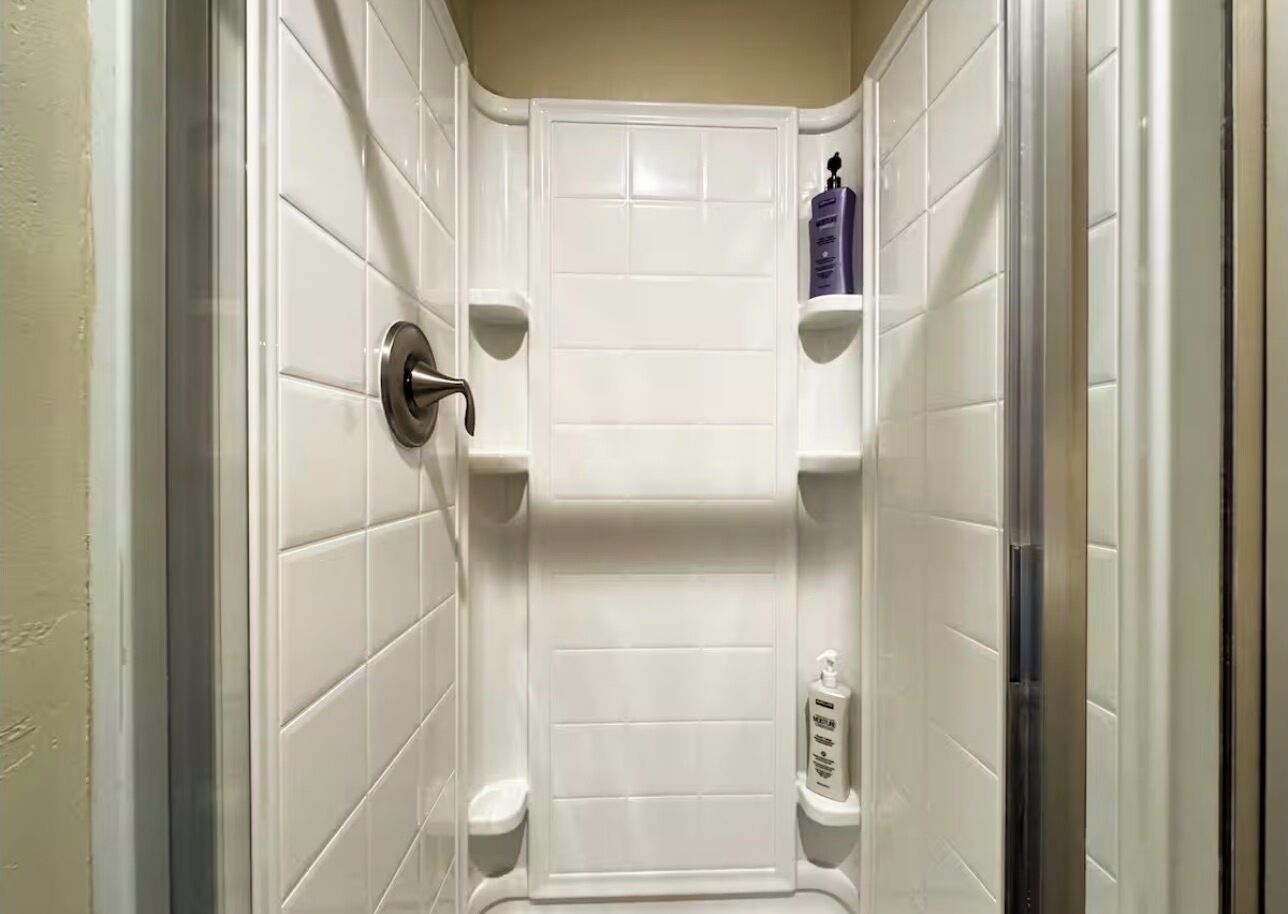 Shower, towels, soap, toilet paper