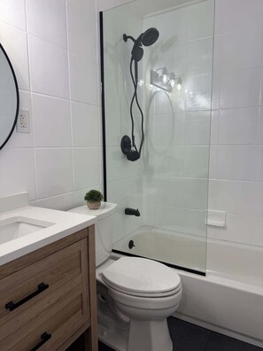Shower, hair dryer, shampoo