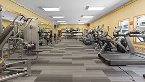 A gym with various exercise machines, treadmills, and weights. - Ls1476-0 (Keystone)