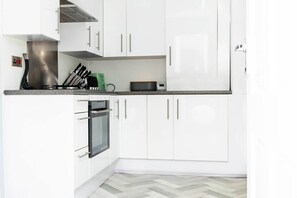 Private kitchen - Elegant and comfortable three-bedroom Flat (Heald Green)