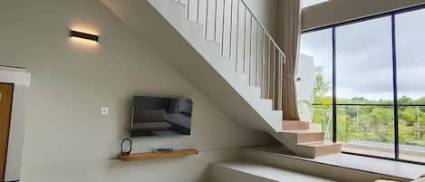 Basic Villa, Courtyard View | Living area | Flat-screen TV
