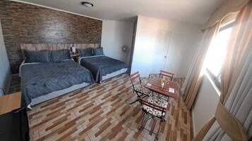 Classic Triple Room, Harbor View | Desk, laptop workspace, free WiFi, wheelchair access
