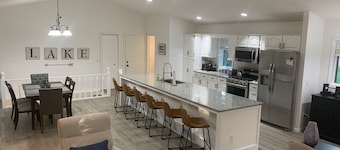 Large Lake House on Triple Lot With Huge Treed Deck Overlooks Water