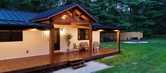 Lovely 2-bedroom cottage with covered porch, hot tub and campfire area.