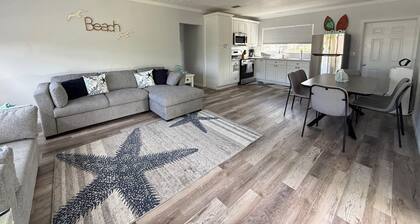 Escape to Sandy Steps.A modern coastal living just seconds from the Beach