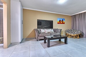 Room, Multiple Bedrooms, Smoking, Fireplace | Living room | Books - Room-45 On Westmoreland Luxury Guest Hou (Johannesburg)