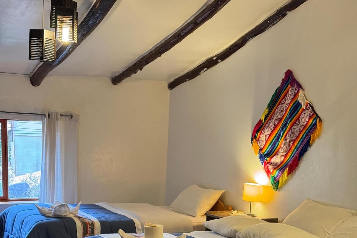Quadruple Room, City View | Laptop workspace, free WiFi