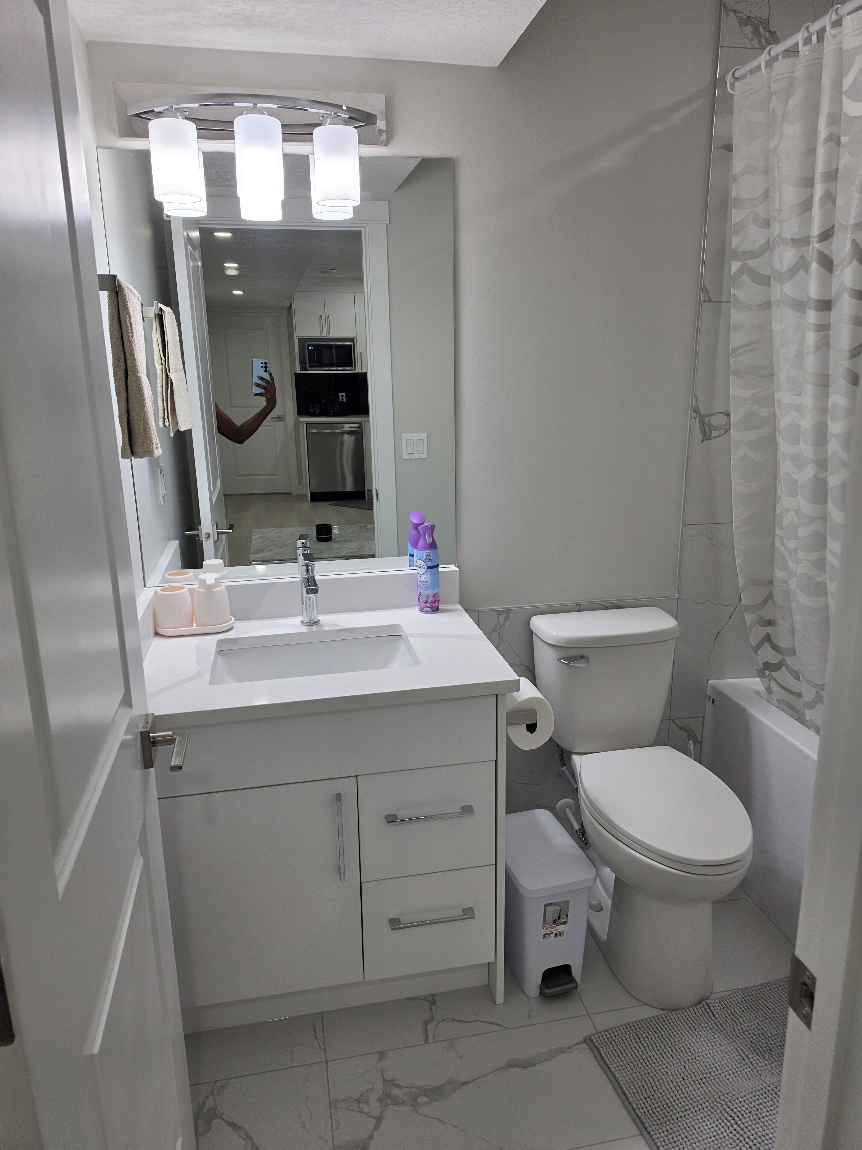 Bidet, towels, toilet paper