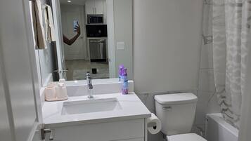 Bidet, towels, toilet paper