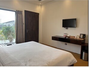 Quarto luxo, vista para o jardim