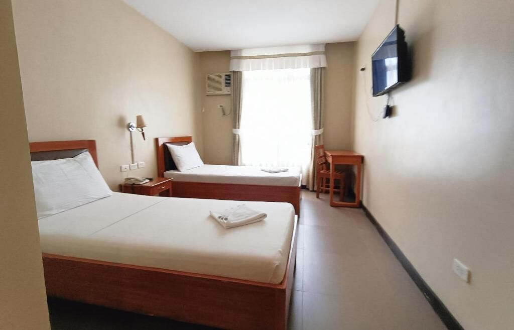 Quarto duplo standard, vista para a cidade