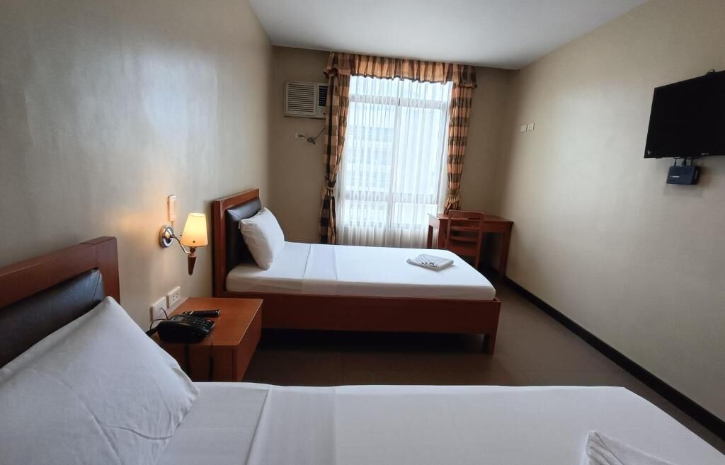 Quarto duplo luxo, vista para a cidade