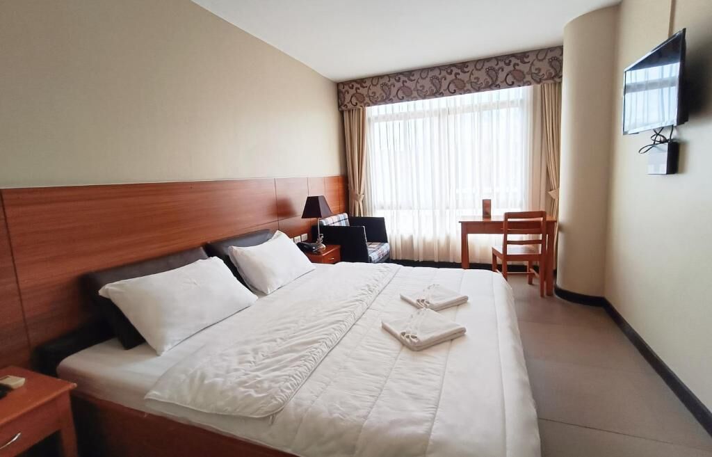 Quarto casal superior, vista para a cidade