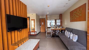 Family Suite, City View | In-room safe, desk, laptop workspace
