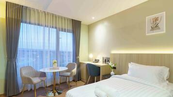 Deluxe Twin Room, Non Smoking, City View | In-room safe, desk, blackout curtains, soundproofing