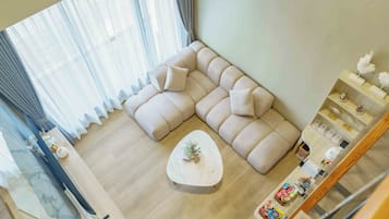 Duplex, Non Smoking, City View | Living area | 55-inch Smart TV with digital channels