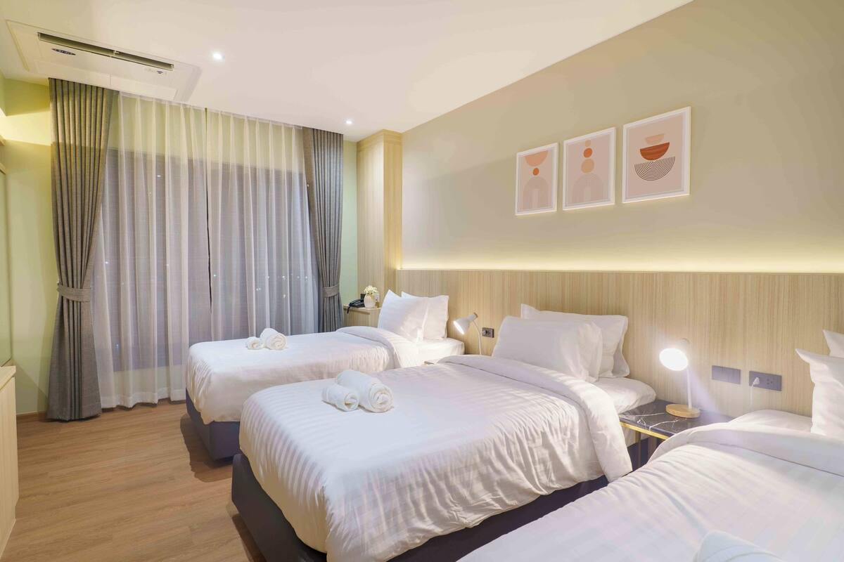 Comfort Triple Room, City View | In-room safe, desk, blackout drapes, soundproofing