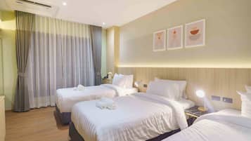 Comfort Triple Room, City View | In-room safe, desk, blackout drapes, soundproofing