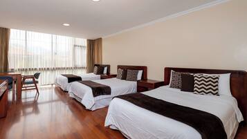 Superior Triple Room | Desk, laptop workspace, blackout drapes, soundproofing