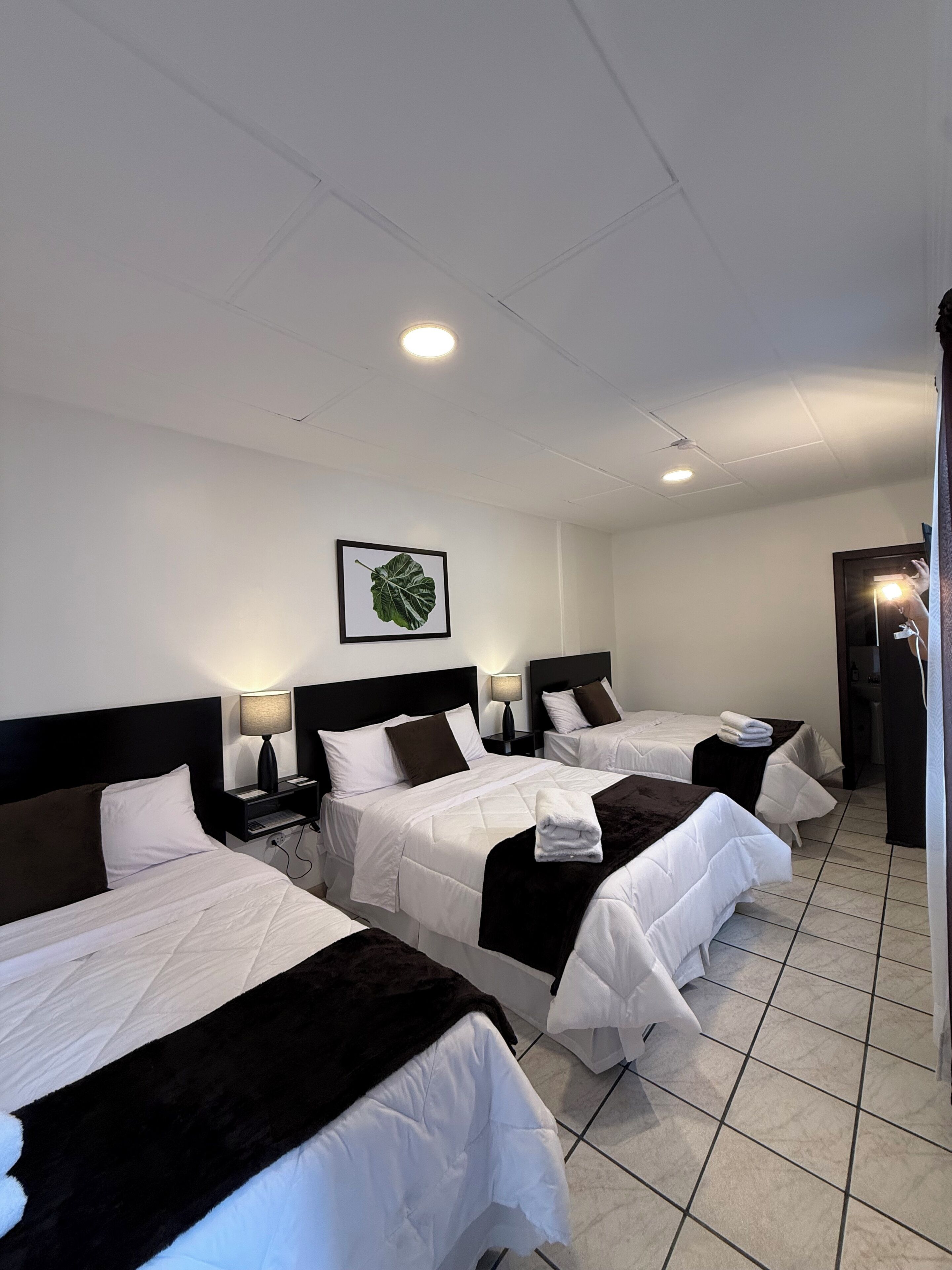 Standard Triple Room | Desk, laptop workspace, blackout drapes, soundproofing