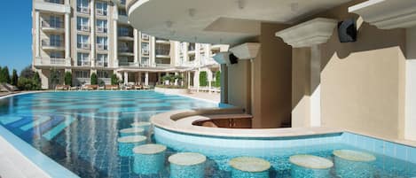 Indoor pool, seasonal outdoor pool, pool umbrellas, sun loungers