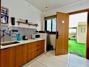 Private kitchen - PrimeStay 1Bhk Penthouse : Vijay Nagar. (Indore)