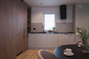 Deluxe Suite, City View | Private kitchen - NG Apartments (Rzeszow)